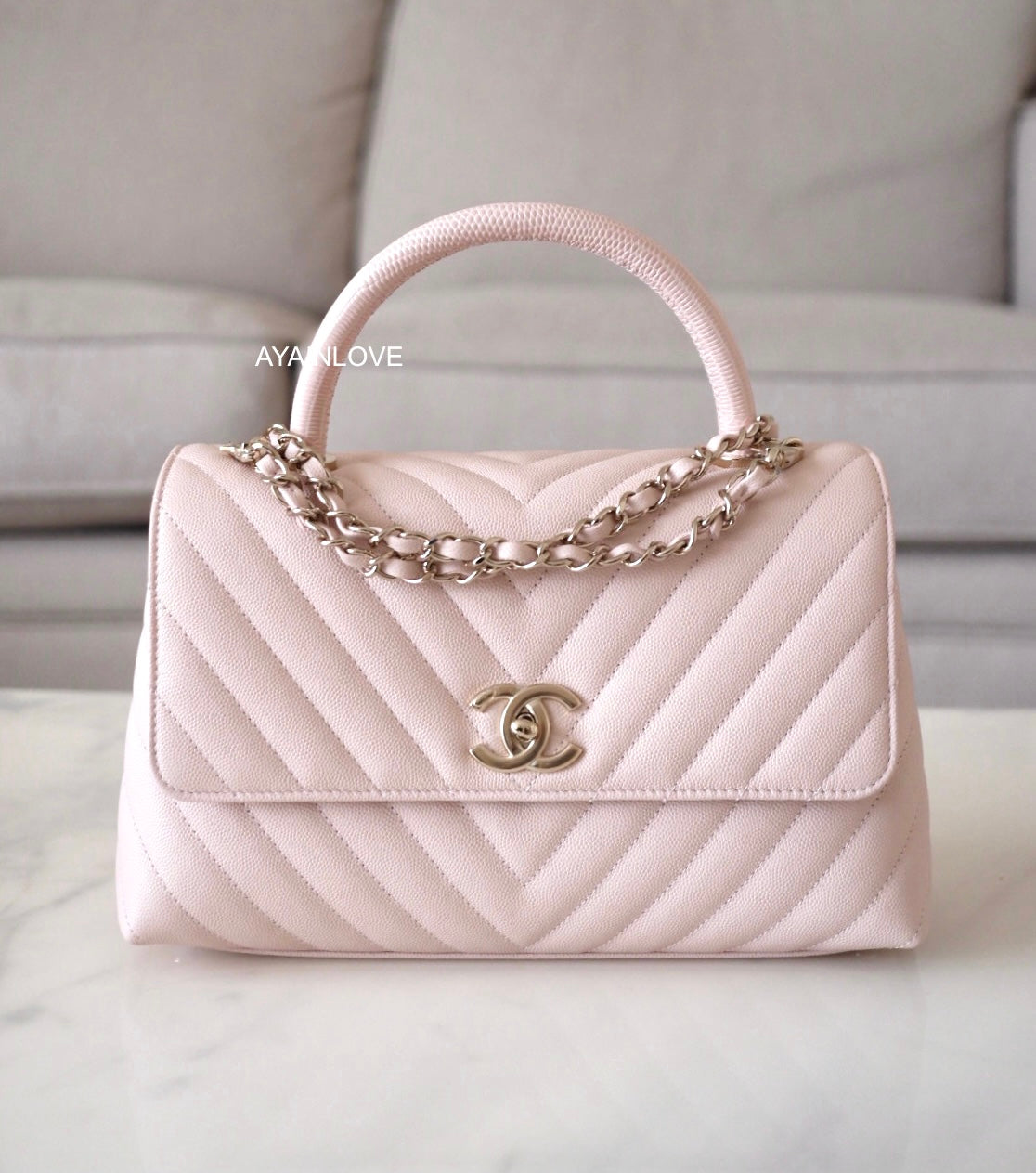 Chanel Coco Handle 20A Beige Chevron Caviar with light gold hardware