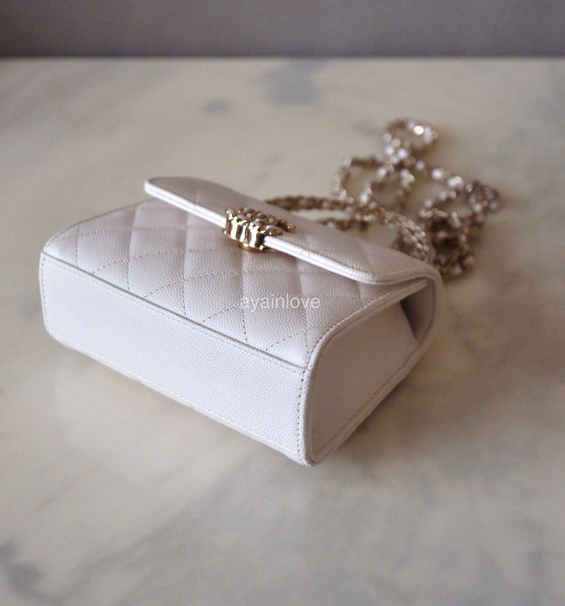 CHANEL 23P White Caviar Kelly Clutch Top Handle with Chain Light Gold Hardware