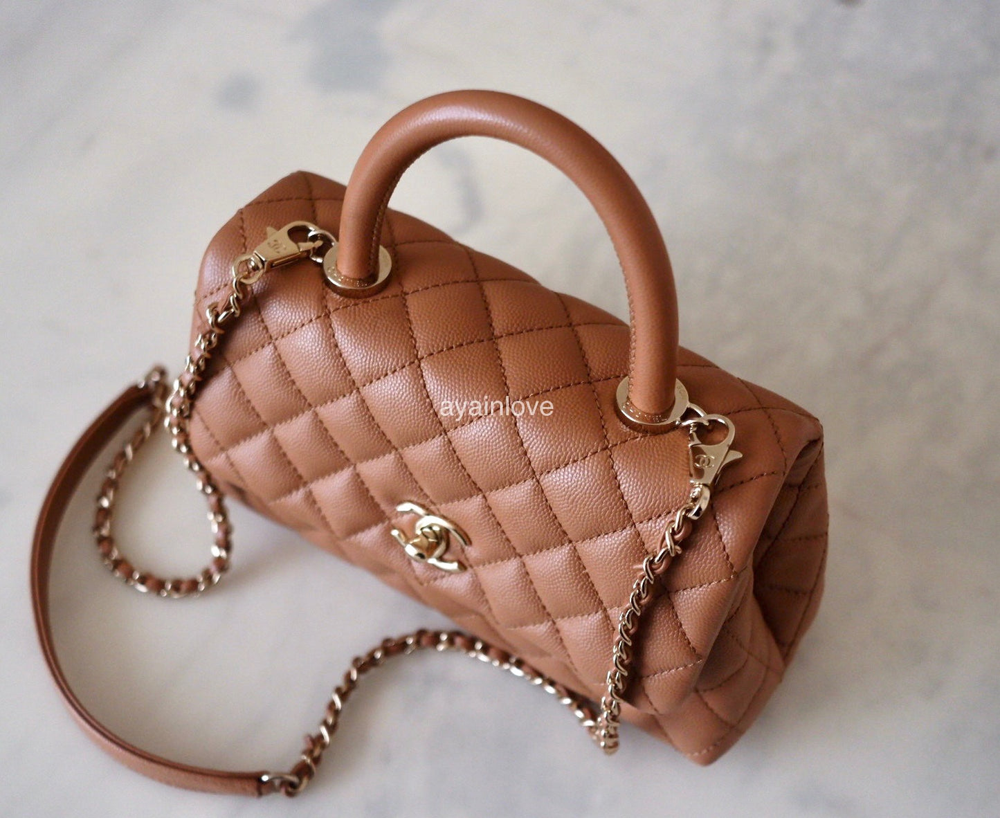 CHANEL 21P Caramel Brown Caviar Small Coco Handle 24 cm Light Gold Hardware