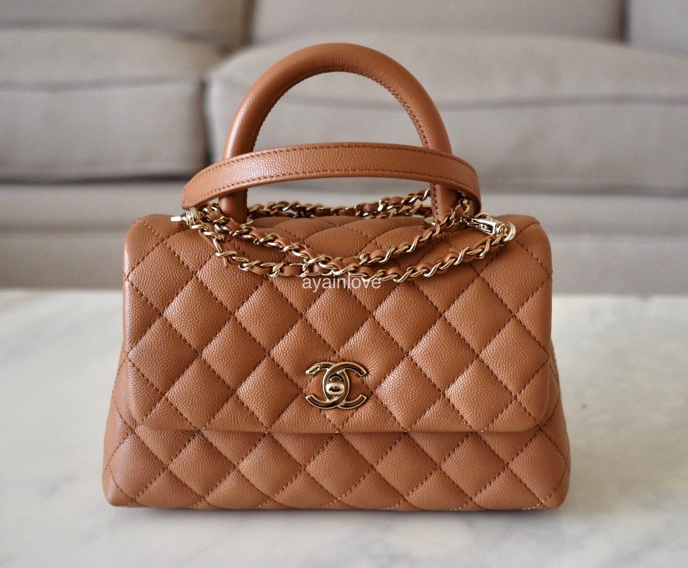 CHANEL 21P Caramel Brown Caviar Small Coco Handle 24 cm Light Gold Hardware