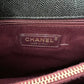 CHANEL Black Caviar Chevron Large Coco Handle 29 cm Flap Bag Brushed Gold Hardware