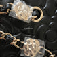 CHANEL 21S Black Camelia Rectangular Vanity on Chain Light Gold Hardware
