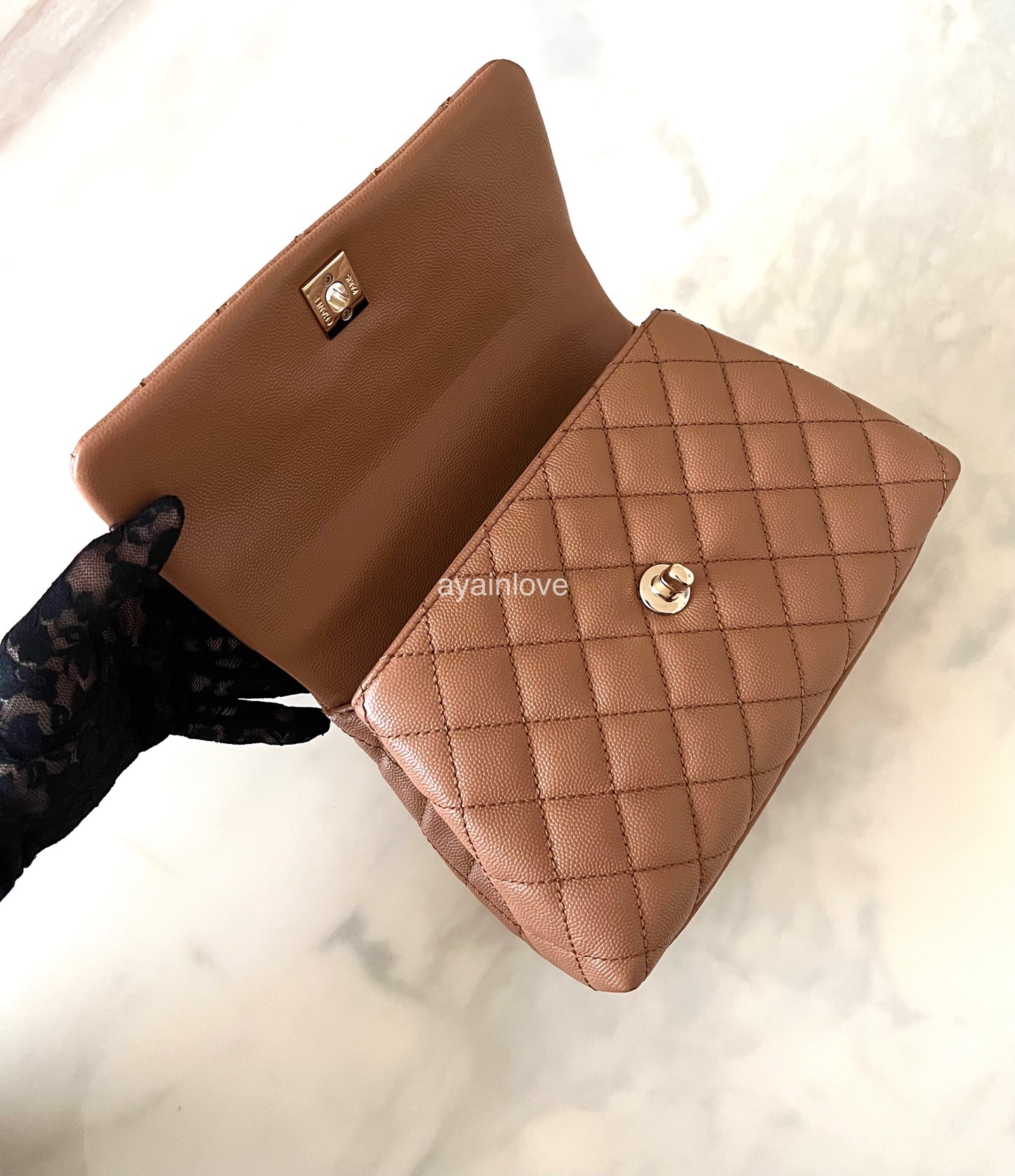 CHANEL 21P Caramel Brown Caviar Small Coco Handle 24 cm Light Gold Hardware