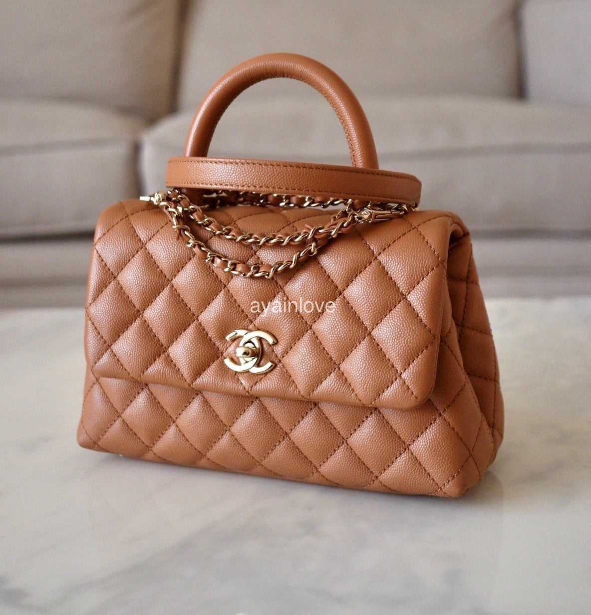 CHANEL 21P Caramel Brown Caviar Small Coco Handle 24 cm Light Gold Hardware