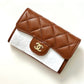 CHANEL 23A Caramel Brown Caviar Classic Small Snap Card Holder Light Gold Hardware is