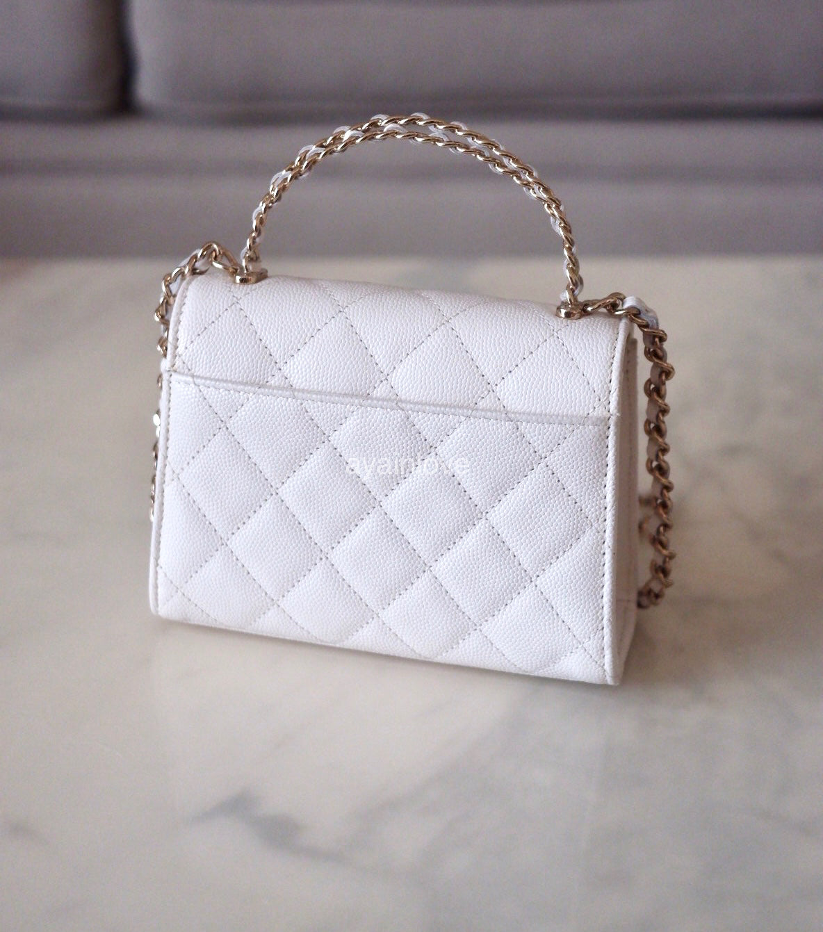 CHANEL 23P White Caviar Kelly Clutch Top Handle with Chain Light Gold Hardware