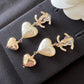 CHANEL Double Heart Pearl Drop Earrings Clip-On Light Gold Hardware