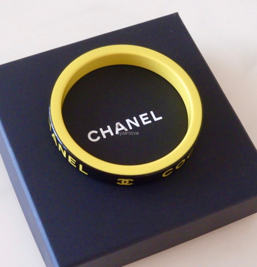 CHANEL 22S Yellow Black Resin Coco Bangle Bracelet