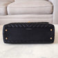 CHANEL Black Caviar Chevron Large Coco Handle 29 cm Flap Bag Brushed Gold Hardware