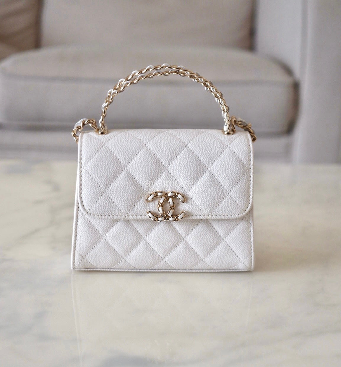 CHANEL 23P White Caviar Kelly Clutch Top Handle with Chain Light Gold Hardware