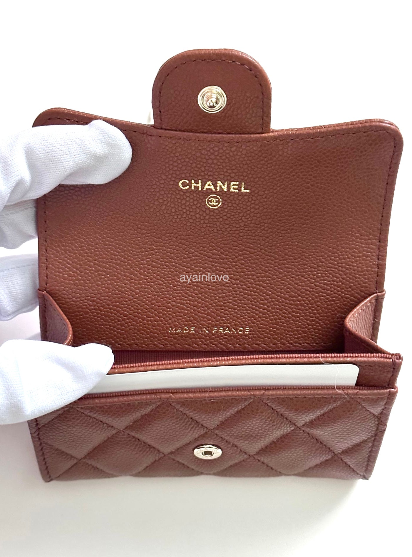 CHANEL 23A Caramel Brown Caviar Classic Small Snap Card Holder Light Gold Hardware is