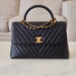 CHANEL Black Caviar Chevron Large Coco Handle 29 cm Flap Bag Brushed Gold Hardware