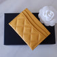 CHANEL 23A Yellow Caviar Flat Card Holder Light Gold Hardware
