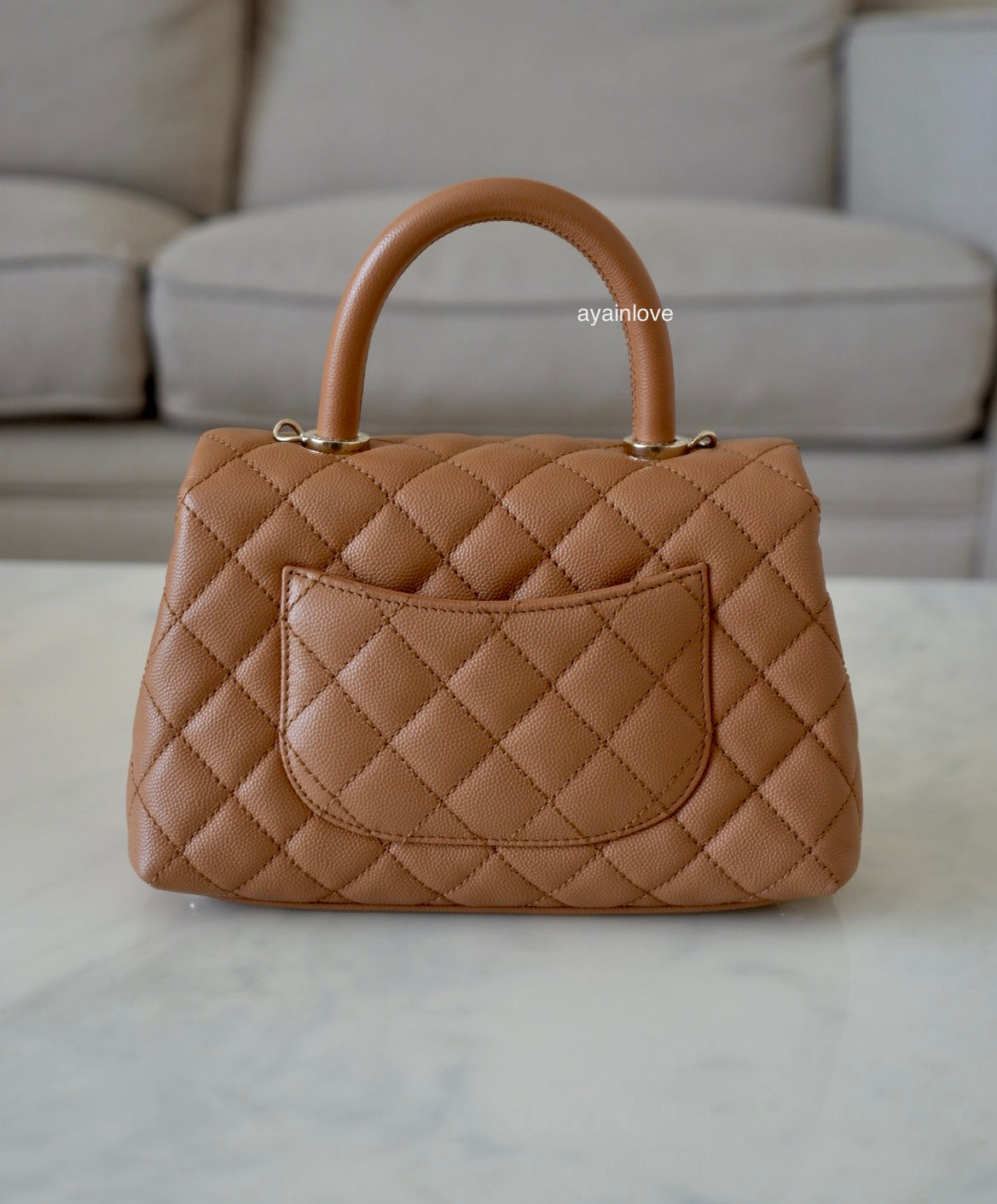 CHANEL 21P Caramel Brown Caviar Small Coco Handle 24 cm Light Gold Hardware