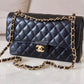 CHANEL Black Caviar Medium/Large Microchipped Classic Flap Bag Gold Hardware