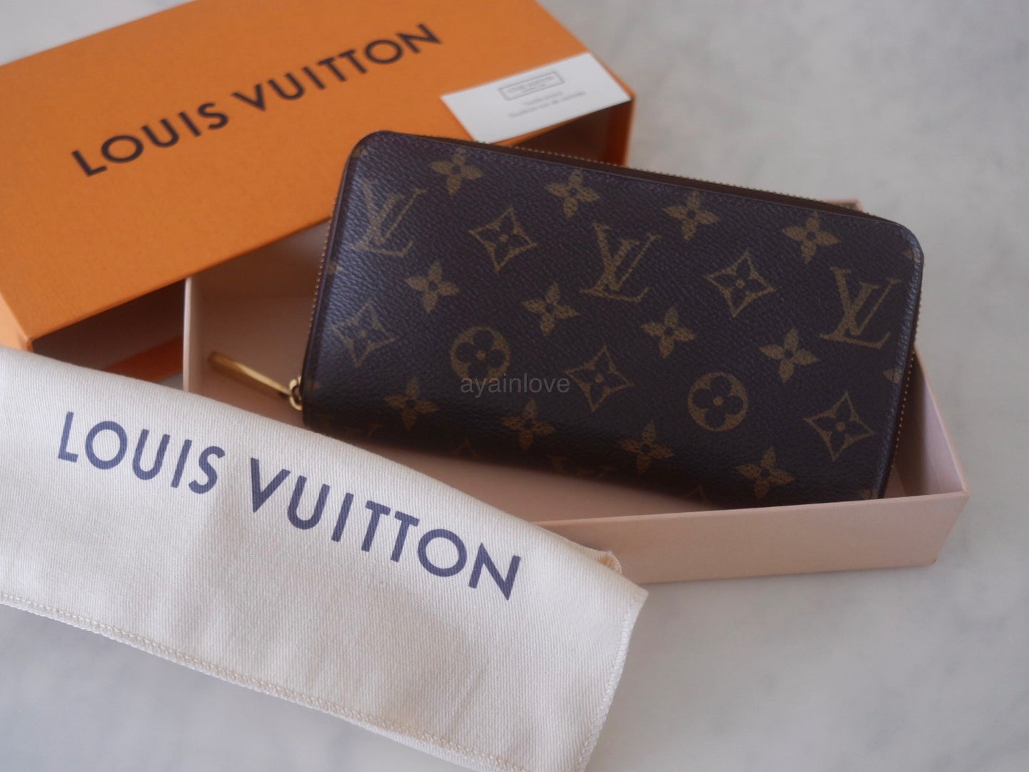 Louis Vuitton Monogram Snap Compact Zippy Wallet