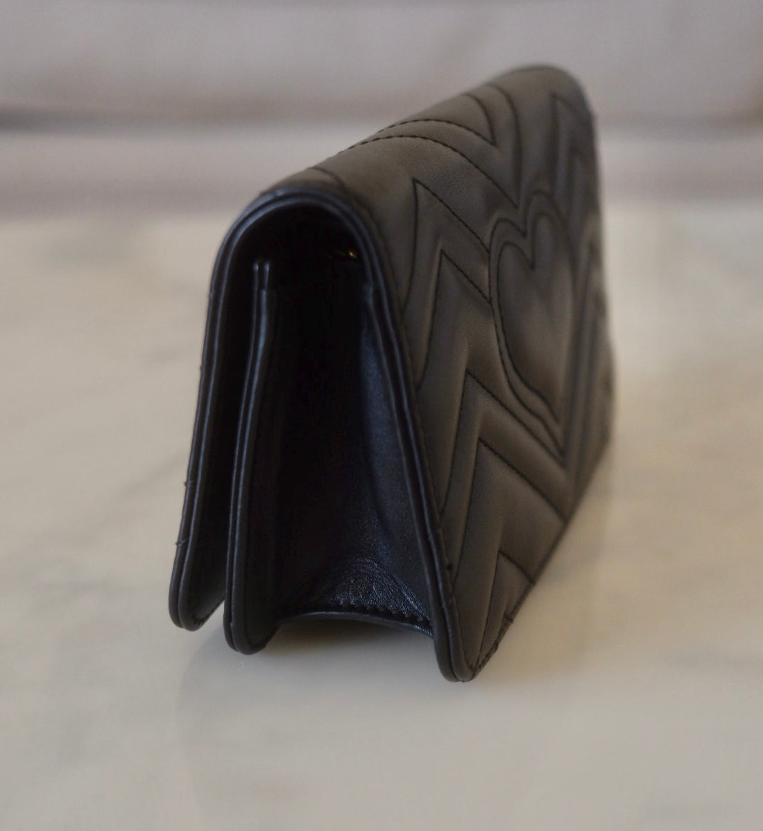 Black matelassé chevron leather online