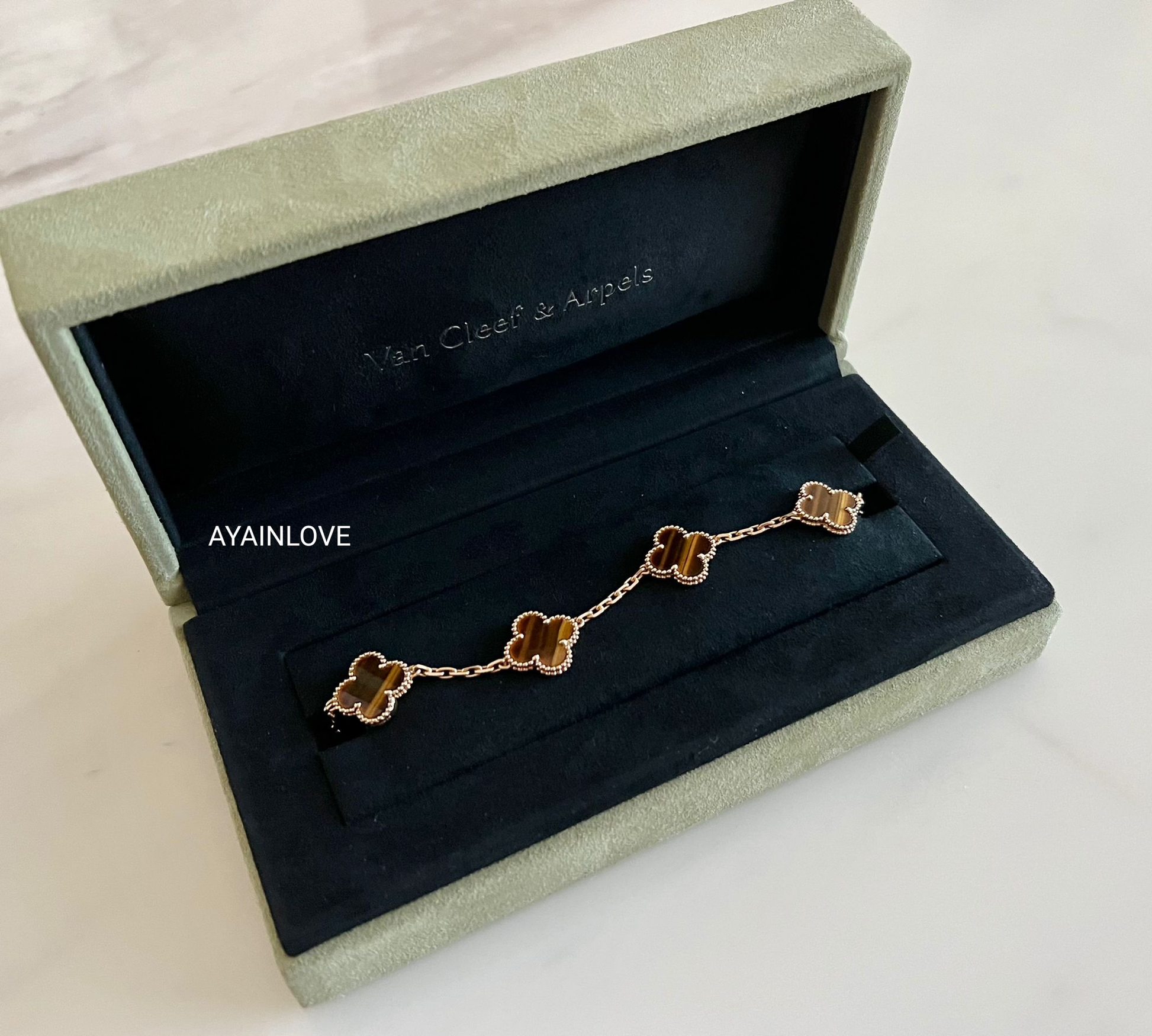 Van Cleef and Arpels Tiger's Eye Vintage Alhambra 5 Motif Gold Bracelet at  1stDibs