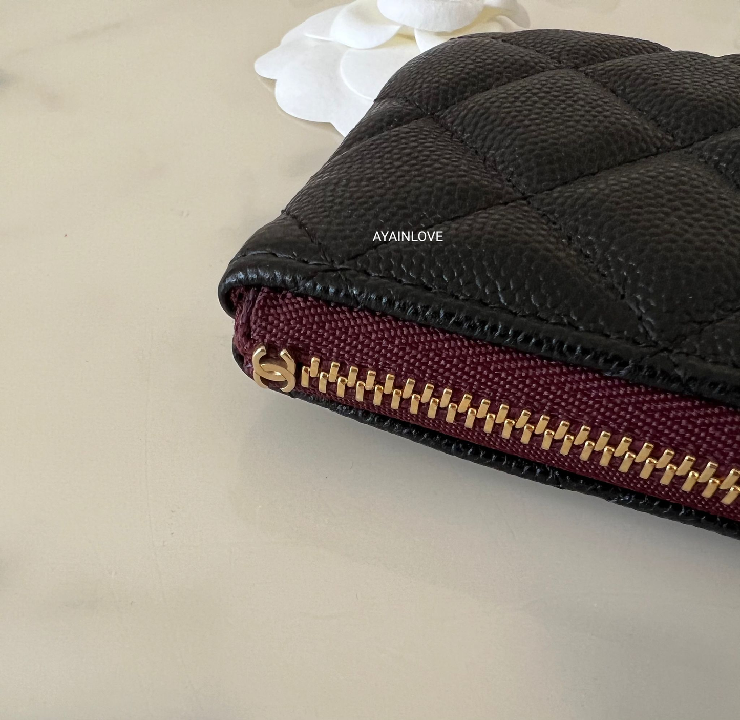 CLASSIC BLACK CAVIAR MINI O CASE GOLD HARDWARE BURGUNDY LINING