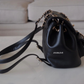 CHANEL 22A Mini Duma Black Lamb Skin Drawstring Backpack Light Gold Hardware*New*