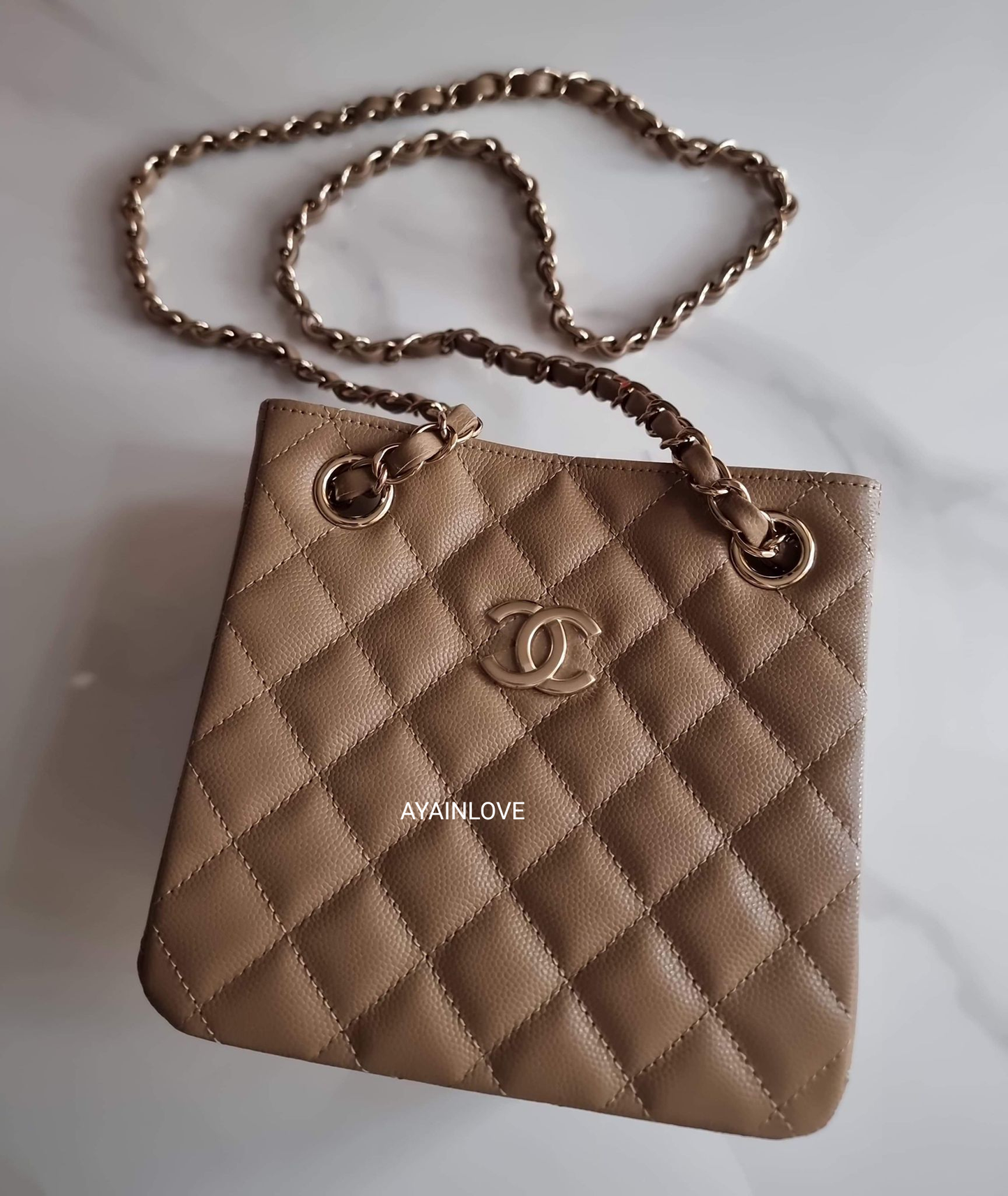 CHANEL 22A Dark Beige Caviar Mini Bucket Bag Light Gold Hardware