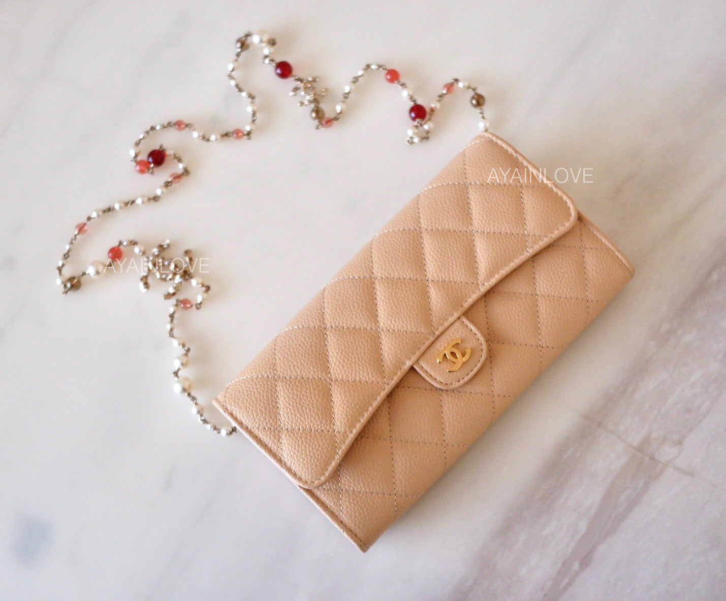 Chanel beige online clutch