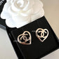 CHANEL 22P Heart Stud CC Earrings Light Gold Hardware