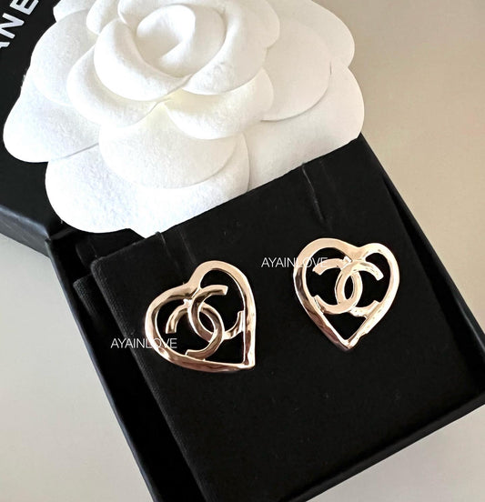 CHANEL 22P Heart Stud CC Earrings Light Gold Hardware