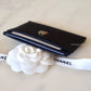 CHANEL 22P Black Caviar Camellia Flat Card Holder Light Gold Hardware