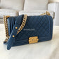 CHANEL Navy Blue Caviar Old Medium Boy Flap Bag Brushed Gold Hardware