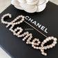 CHANEL 19K Script Pearl Diamante Brooch Light Gold Hardware