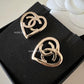 CHANEL 22P Heart Stud CC Earrings Light Gold Hardware